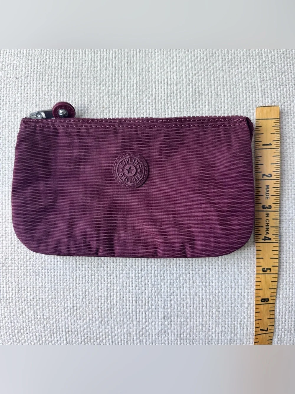 Kipling Creativity Large Maroon Pouch with Embossed Logo